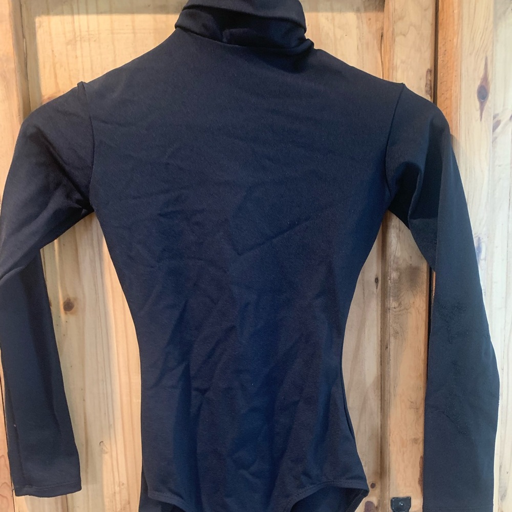 Black long sleeve turtleneck leotard.